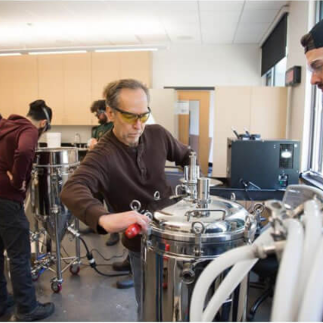 Instructor and students in the SPCSS brewing lab.