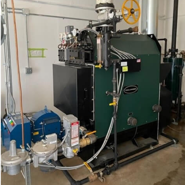 Their Columbia MPH 50 boiler provides steady steam heat for the distillery and brew house.