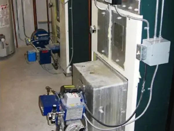 Two Columbia/Shenandoah WL-60 waste oil and natural gas fired boilers. One boiler burns waste oil from the shop and the other is natural gas powered.