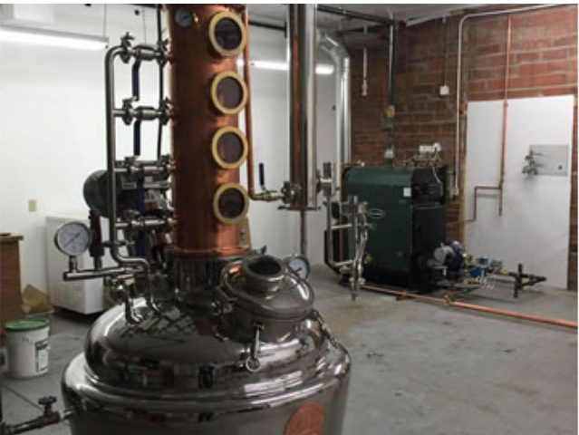 Their still with their Columbia low pressure steam boiler in the background.