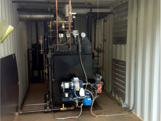 Smart! To save space and save the expense of building a fire proof room boiler room to meet state regulations they put their boiler is in shipping container.