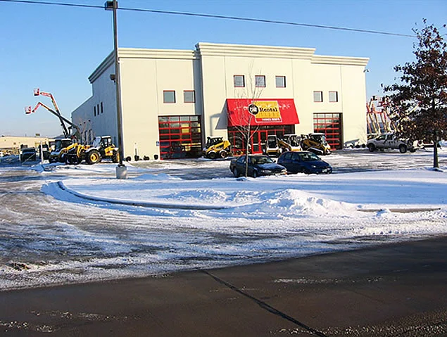 It is freezing cold outside but inside it's warm from the ground up - warming the mechanics and the trucks they're working on. Radiant heat also keeps floors dry and free of ice.