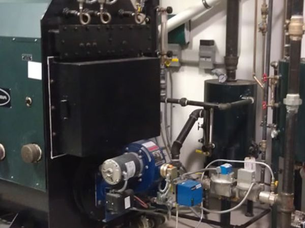 Columbia MPH-20 low pressure steam boiler with blow down, PowerFlame burner, and condensate water feed to supply heat for brewing delicious Conshohocken craft beer.