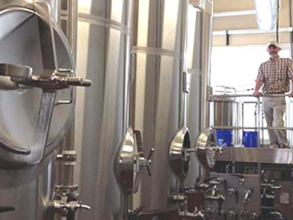 Mark Twain Brewery's brew house with 13 stainless steel tanks, 4 fermentation tans, and 6 serving tanks. Mark Twain's brewers are devoted to the traditional craft of brewing and bringing back traditional beer styles.