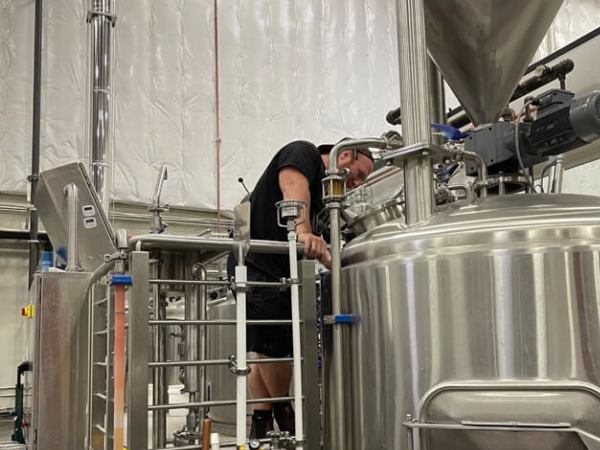 Owner and brewmaster David Skiba doing a quality check.