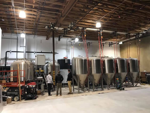In 2020 Urban Family moved into their new, larger brewery in Ballard – check out their new, larger brew house during construction!