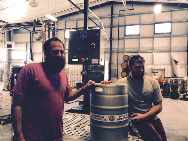 "Head Brewer and Mad Chemist" (yes, that's really his title) and his cohort, preparing to brew more irresistible beers.