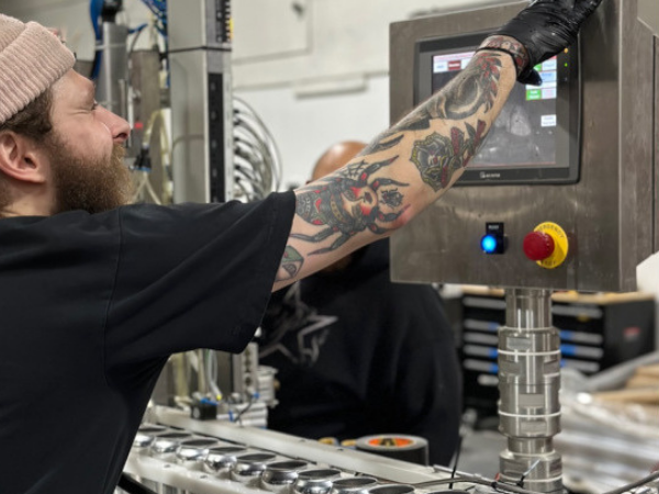 Setting up their new canning line.