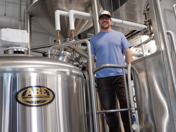 Head brewer, Sam Milne, in their ABE brew house