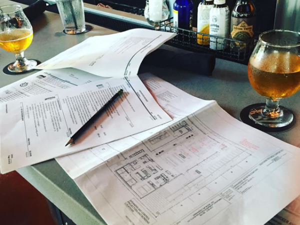 Finalizing kitchen and AV designs.