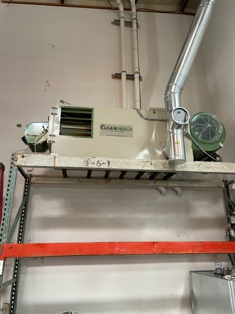 Rack-mounted Clean Energy 330, 325,000 BTU waste oil-fueled furnace.