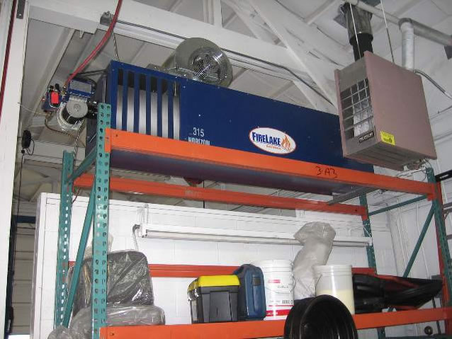 Greg's Puyallup Meridian auto repair center - new Firelake/Shenandoah Horizon 315 (315,000 BTU) used oil fired heater installed on a pallet rack above their waste oil tank.