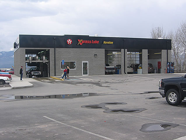 Four bay lube facility and car wash with heat and hot water supplied by waste oil boilers.