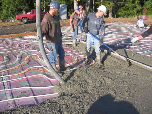 Start of concrete pour for the slab.