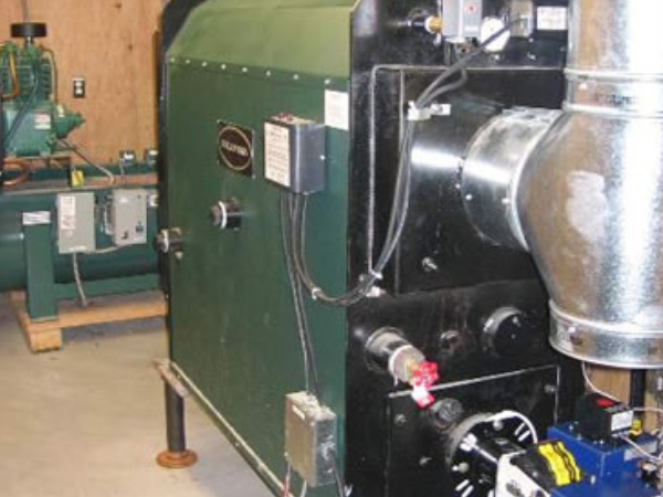 Columbia KWO-500 (500,000 BTU) boiler installed to heat the water circulating through the PEX tubing in the radiant floor heating system.
