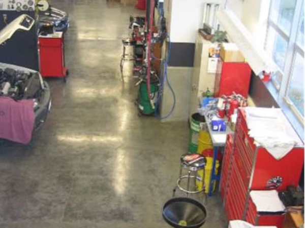 Auto repair shop interior with radiant floor heat installed.
