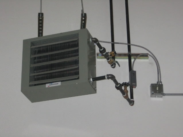 One of several hot water hydronic unit heaters which heat the facility.