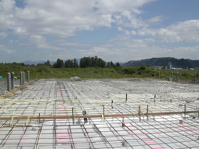 PEX tubing for radiant floor in place ready for concrete floor to be poured.